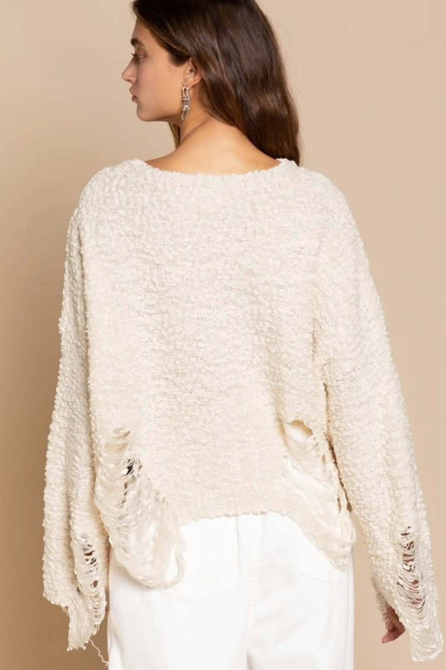 Cream ripped sweater
