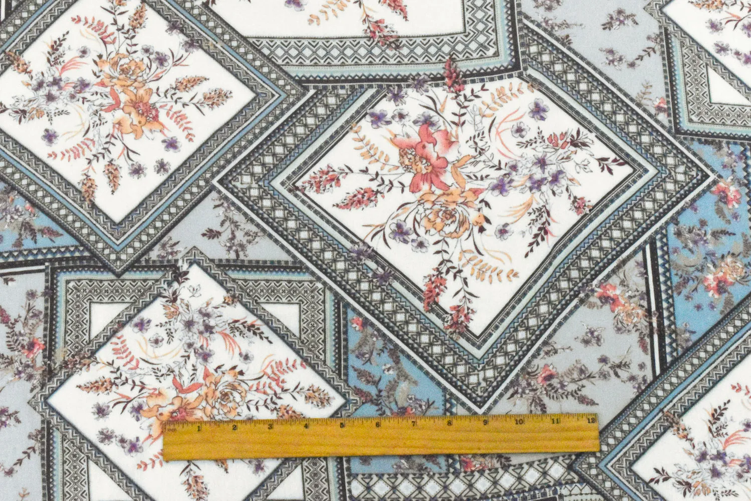 Ivory-Blue-Multi Floral Frame Printed Rayon Crepe Woven Fabric